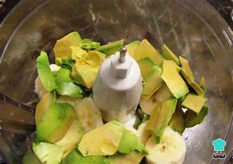 A Food Processor Filled With Chopped Fruit And Other Things To Make It