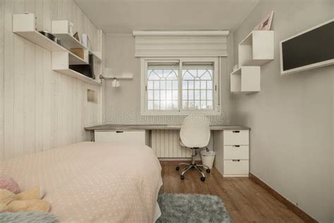 Youth Bedroom With Single Bed With A Study Table With Drawers And White