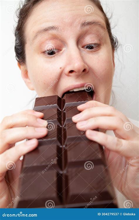 Young Woman Biting A Huge Bar Of Chocolate Stock Image Image Of