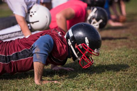 American Football Team Doing Push Ups 12713239 Stock Photo At Vecteezy