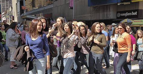 NYC Travel Diary Women Looking At Naked Cowboy NYC Times Square 2009