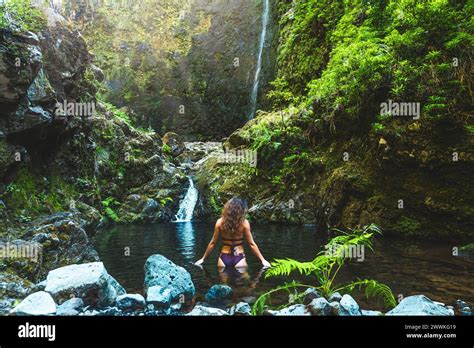 Description Tourist Woman In Bikini Enjoys A Refreshing Bath In The