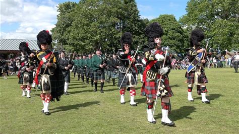 Drum Majors Lead The Massed Pipes Drums Afternoon Parade During