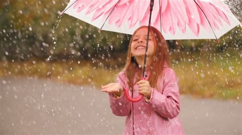 Cheerful Girl with Umbrella Under Rain, Stock Footage | VideoHive