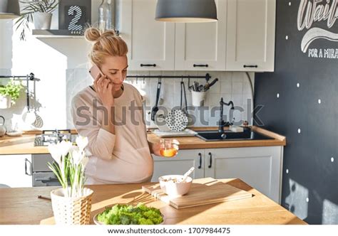 Happy Cute Blonde Phoning Making Dinner Stock Photo 1707984475 Shutterstock