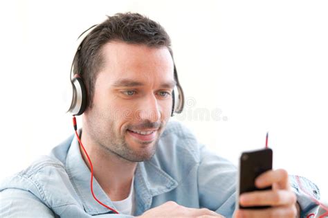 Young Relaxed Man Listening Music In A Sofa Stock Photo Image Of