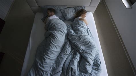 Why Couples Could Benefit From Sleeping In Separate Beds