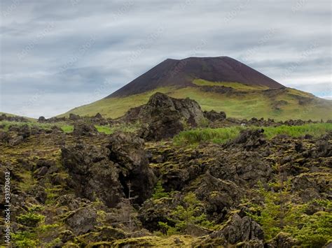 Lava fields in front of the Eldfell volcano, Heimaey, Vestmannaeyjar ...