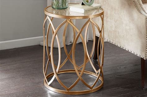 This metal accent table adds just the right amount of transitional appeal to your dÃ©cor ...