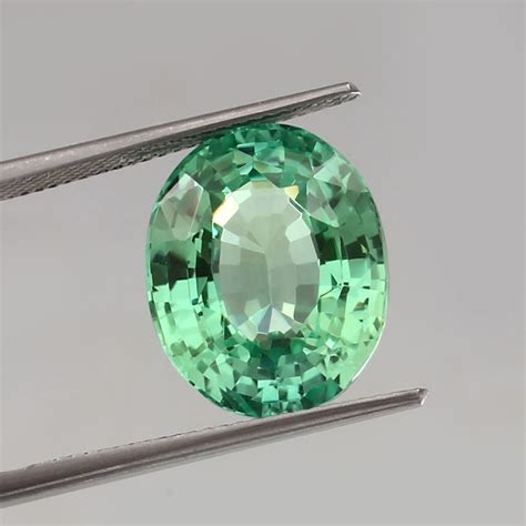 Aaa Natural Flawless Green Ceylon Parti Sapphire Loose Oval Gemstone