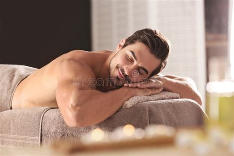 Handsome Young Man Relaxing On Massage Table Stock Image Image Of Portrait Cosmetology 155172989