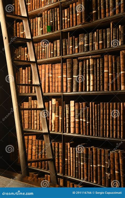 Old Books On The Shelves Inside The Old Library In Trinity College Dublin Ireland Editorial