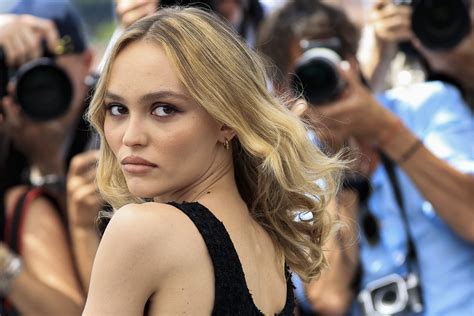 Lily Rose Depp Looks Ultra Chic In Little Black Dress At Cannes Parade