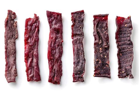 Assorted Beef Jerky On White Background Collection Of Beef Jerky