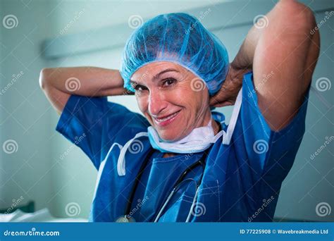 Portrait Of Surgeon Wearing Surgical Mask In Surgical Room Stock Photo