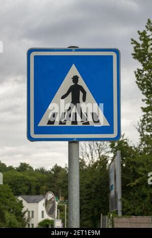 Pedestrian Crossing Square Blue And White Road Sign With Yellow Frame