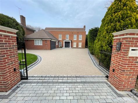 Light Grey Granite Borders With Resin Bonded Stone As Main Area