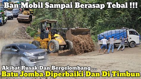 Ban Mobil Sampai Berasap Akibat Jalan Rusak Batu Jomba Diperbaiki