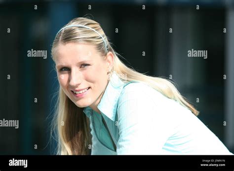 Woman Leaning Forward Stock Photo Alamy
