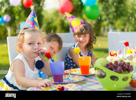 Pretty Girl Smilling At Childs Birthday Party Stock Photo Alamy