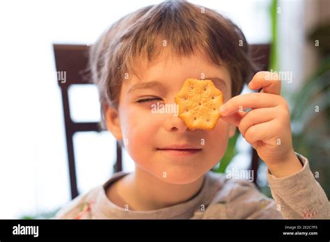 Cute Boy Making Cookie Stock Photo Alamy