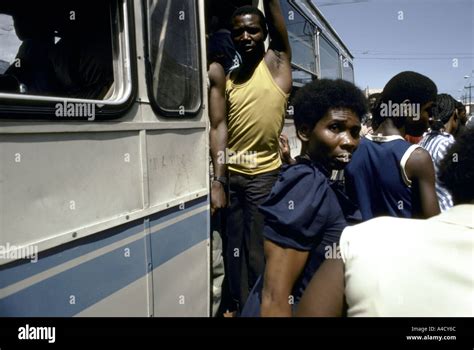 A crowded scene outside a bus. Kingston, Jamaica Stock Photo - Alamy