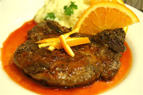 Chuletas De Cerdo En Salsa De Naranja Y Ensalada De Espinacas R Cula Y