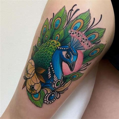 Peacock Tattoos On The Thigh 10 Designs Of Grace And Beauty