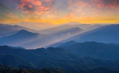 Golden Light Rays Shining Down To Mountains Sun Rays Over Valley Sun