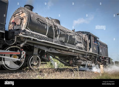 A Garratt Steam Locomotive Crossing The Victoria Falls Bridge Zimbabwe