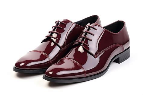 Premium AI Image | Elegant Patent Leather Formal Dress Shoes in Deep Burgundy