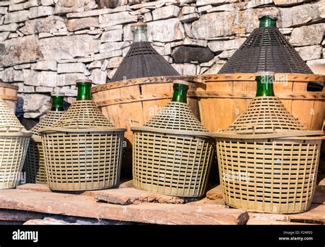 Demijohns Of Wine In A Stone Cellar Stock Photo Alamy