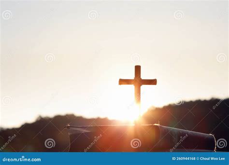 Bright Sunlight Bible And Holy Crucifixion Of Jesus Christ Stock Photo