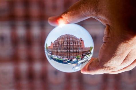 Premium Photo Cropped Hand Of Person Holding Crystal Ball