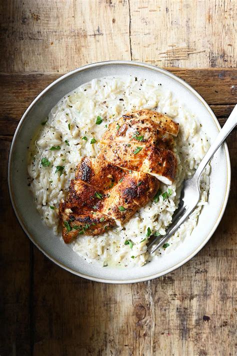 One Pot Creamy Chicken And Rice Serving Dumplings