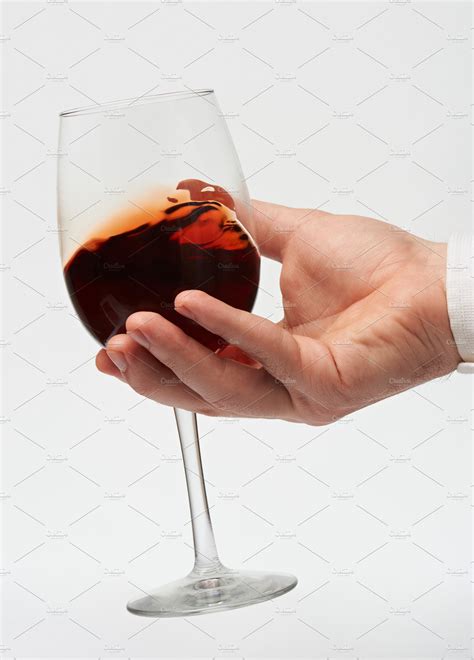 Hand Hold Red Wine Glass Containing Wine Glass And Hand Food Images ~ Creative Market