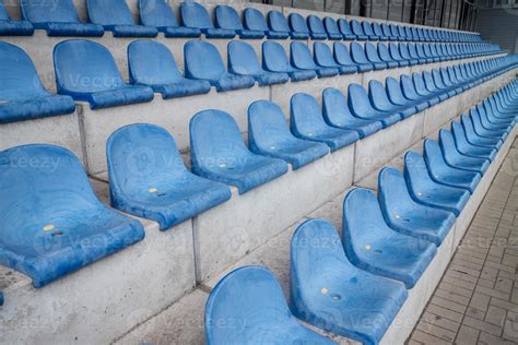 blue seats in a stadium 8669998 Stock Photo at Vecteezy