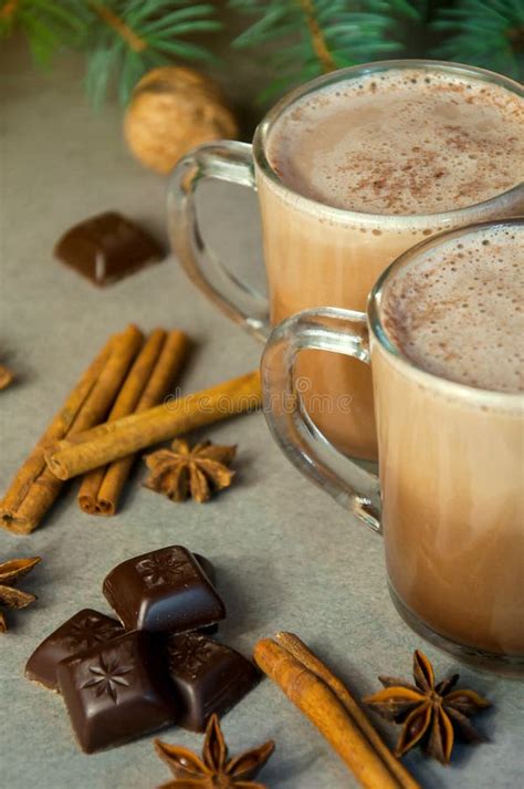 Hot Christmas Drink Cocoa Coffee Or Chocolate With Milk In A Small Cup Fir Tree Branch Nuts