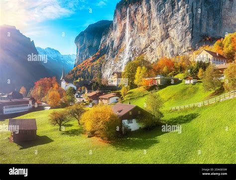 Fantastic Autumn View Of Lauterbrunnen Village With Awesome Waterfall