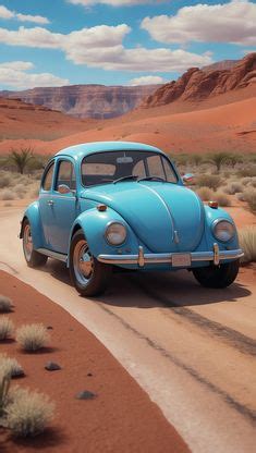 Blue Car Driving Down A Dirt Road In The Desert In 2024 Vw Art Old