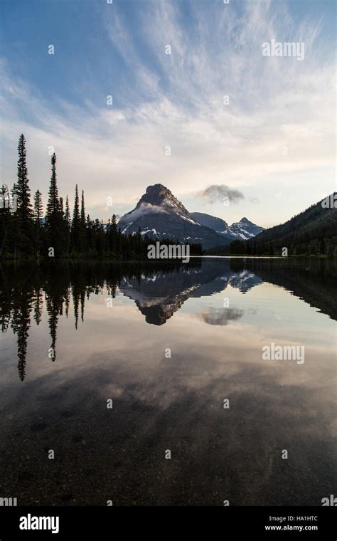 Glaciernps 27680712751 Calm Pray Lake And Sinopah Portrait Stock Photo