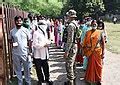 File Voters Standing In The Queue To Cast Their Votes At A Polling