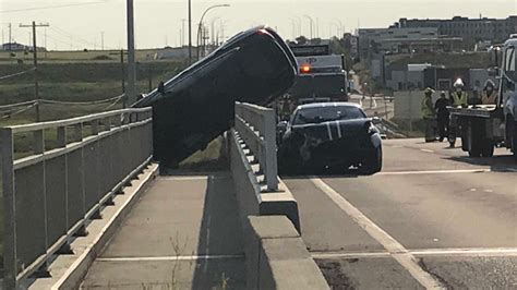 Crash Overturns Vehicle On Concrete Barrier Along Country Hills