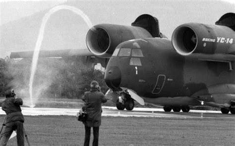 Boeing YC-14 AMST prototype having a drink on the runway : r/WeirdWings