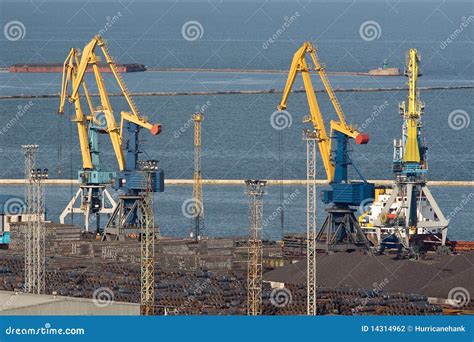 Four Huge Industrial Cranes at the Commercial Dock Stock Photo - Image ...