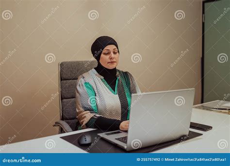 Portrait of a Happy Hijab Muslim Manager at Bright Office. Smiling at ...