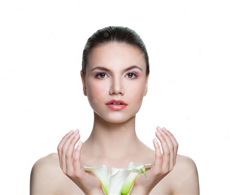 Premium Photo Beautiful Woman With Clear Skin And Flowers Isolated On White Skincare And