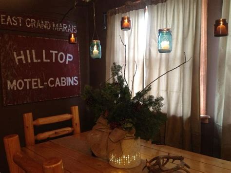 a wooden table topped with a potted plant next to a sign that says ...