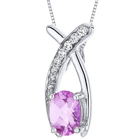 Peora Sterling Silver Created Pink Sapphire Open Infinity Solitaire