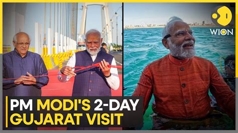 Indian PM Modi Holds Road Show In Rajkot Performs Underwater Puja In